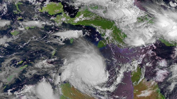 Satellite image of a cyclone approaching land.